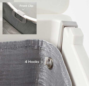 The Flip Tarp Liner is secured buy four hooks and a clip in the front.